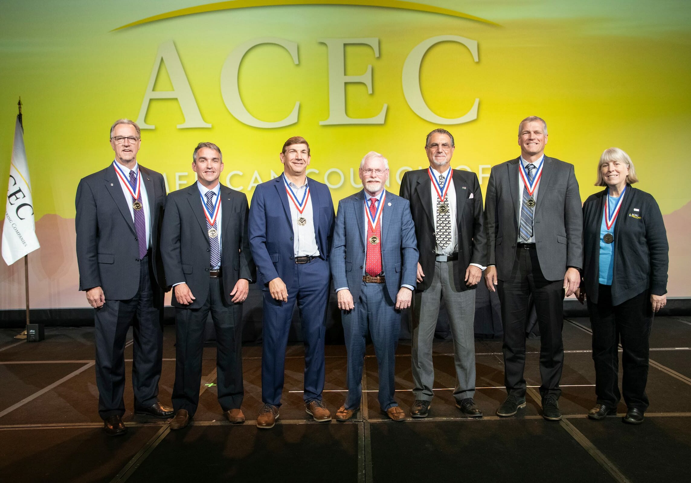 ACEC8836-2795 acec members standing on stage during awarding