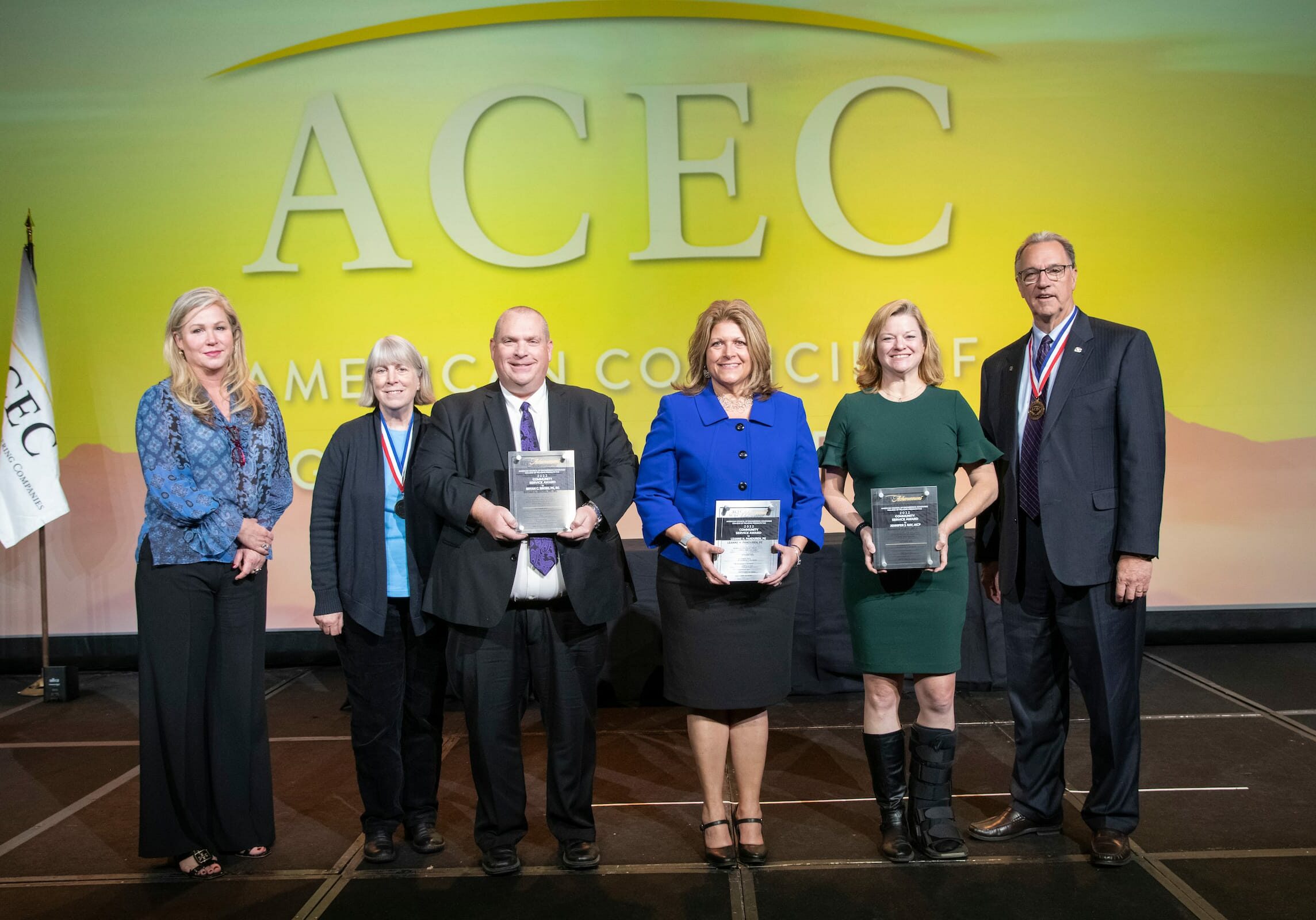 ACEC8836-2798 acec members standing on stage during awarding