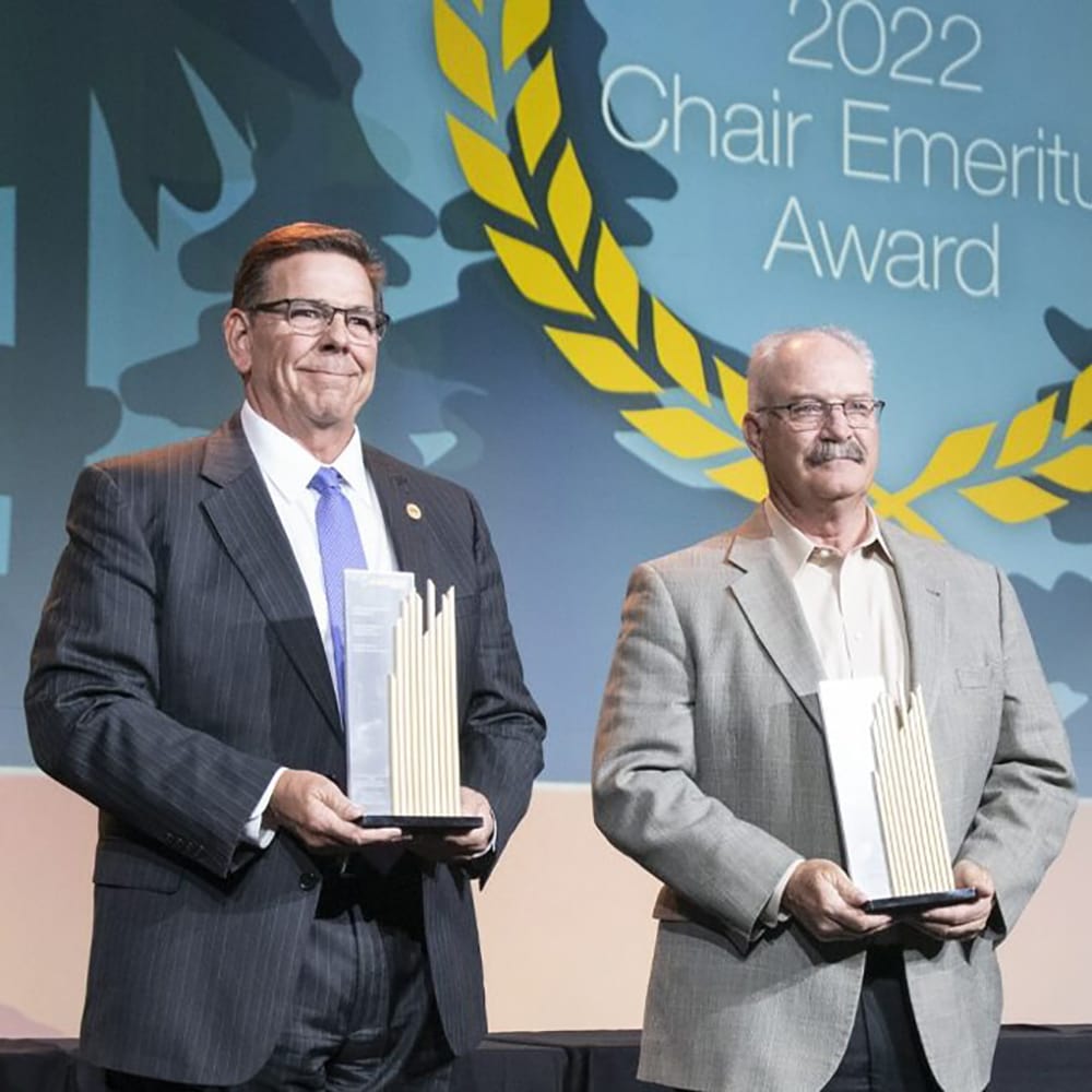 Chair-Emeritus-Award-e1685500384330 ACEC Members holding the Chair Emeritus Award trophy